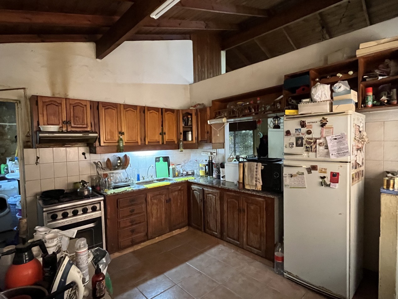 Casa a mejorar y depto. a terminar